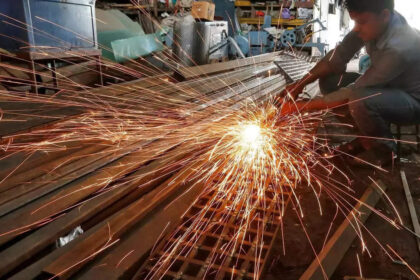 Business activity up in Oct, manufacturing outperforms services