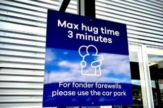 New Zealand airport imposes three-minute limit on hugs