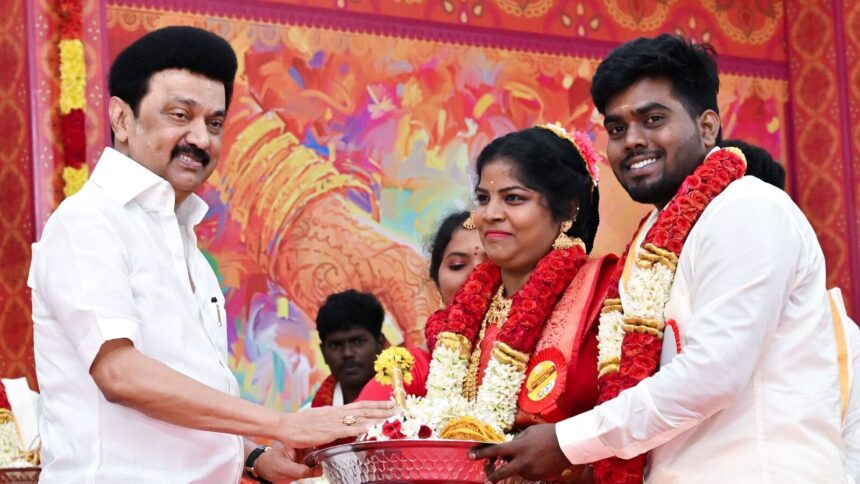 Tamil Nadu CM MK Stalin blesses a couple as he presides over mass marriages of 31 couples, at Marundeeswarar Temple in Chennai on Monday.