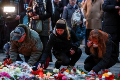 Germans mourn five people killed, 200 injured in Christmas market attack