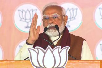 Prime Minister Narendra Modi speaks during a public meeting for Delhi Assembly elections, at Dwarka, in New Delhi.