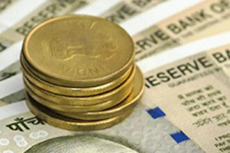 Rupee hits 86 against US dollar, settles 14 paise lower