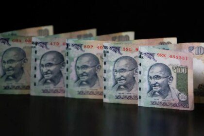 Rupee falls 2 paise to close at 87.21 against US dollar