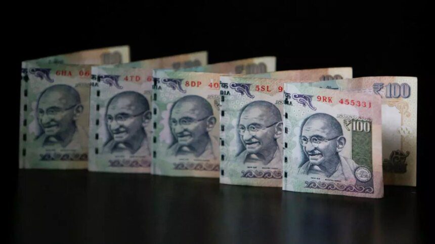 Rupee falls 2 paise to close at 87.21 against US dollar