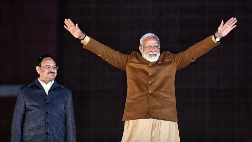 Delhi election result 2025: Prime Minister Narendra Modi greets the supporters as he arrives at Bharatiya Janata Party (BJP) headquarters on the party's win in the Delhi Assembly elections, in New Delhi on Saturday. Union Minister and Bharatiya Janata Party (BJP) National President JP Nadda also present.