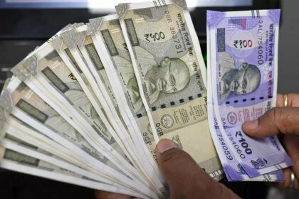 Rupee settles flat at 87.50 against USD after inching close to 88-level in intra-day trade