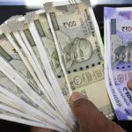 Rupee falls 22 paise to 87.41 against US dollar in early trade