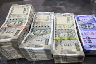 Rupee plunges 16 paise to close at record low of 87.59 against US dollar