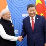 FILE PHOTO: Chinese President Xi Jinping and India Prime Minister Narendra Modi meet on the sidelines of the BRICS summit in Kazan, Russia October 23, 2024.