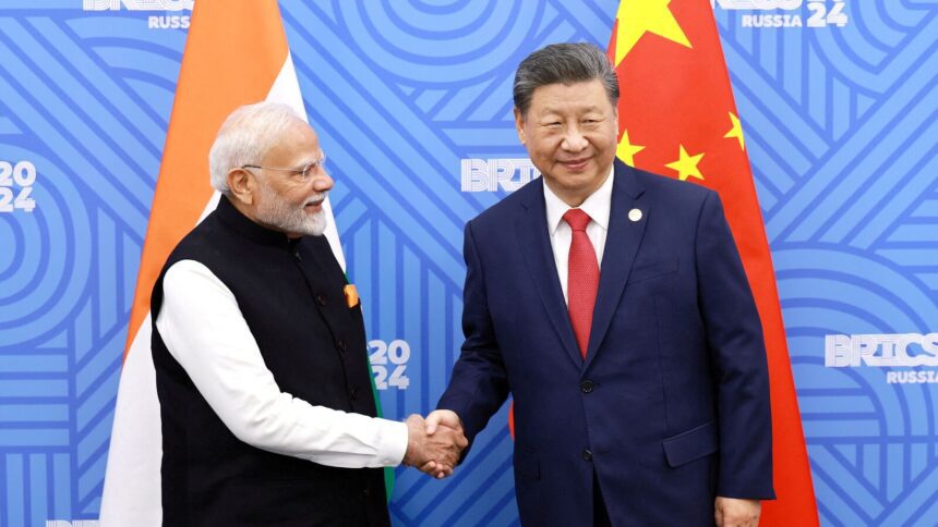 FILE PHOTO: Chinese President Xi Jinping and India Prime Minister Narendra Modi meet on the sidelines of the BRICS summit in Kazan, Russia October 23, 2024.